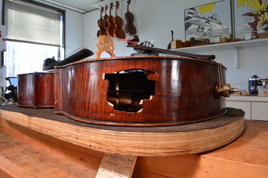 triangle strings | technique article | repairing a hole in the rib of a cello | instrument repair | restoration | wood | luthier | woodworking
